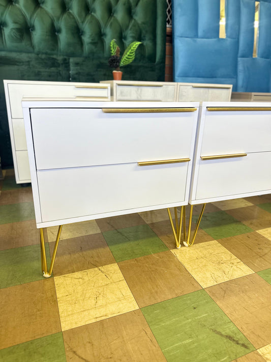 PedastalsEnhance your bedroom with these glossy wood pedestals. Made from premium materials, these bedside tables provide a touch of elegance and sophistication to your spaceLuxe Living InteriorsGlossy Wood Pedastals * 2 - White & Gold